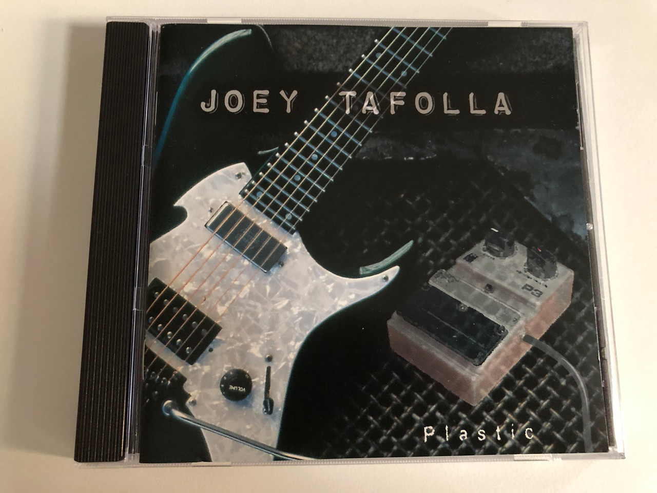 https://cdn10.bigcommerce.com/s-62bdpkt7pb/products/0/images/193917/Joey_Tafolla_Plastic_Mascot_Records_Audio_CD_2001_M_7055_2_1__33561.1633330841.1280.1280.JPG?c=2&_gl=1*j1qvxx*_ga*MjA2NTIxMjE2MC4xNTkwNTEyNTMy*_ga_WS2VZYPC6G*MTYzMzMzMDQyMy4xMTEuMC4xNjMzMzMwNDIzLjYw