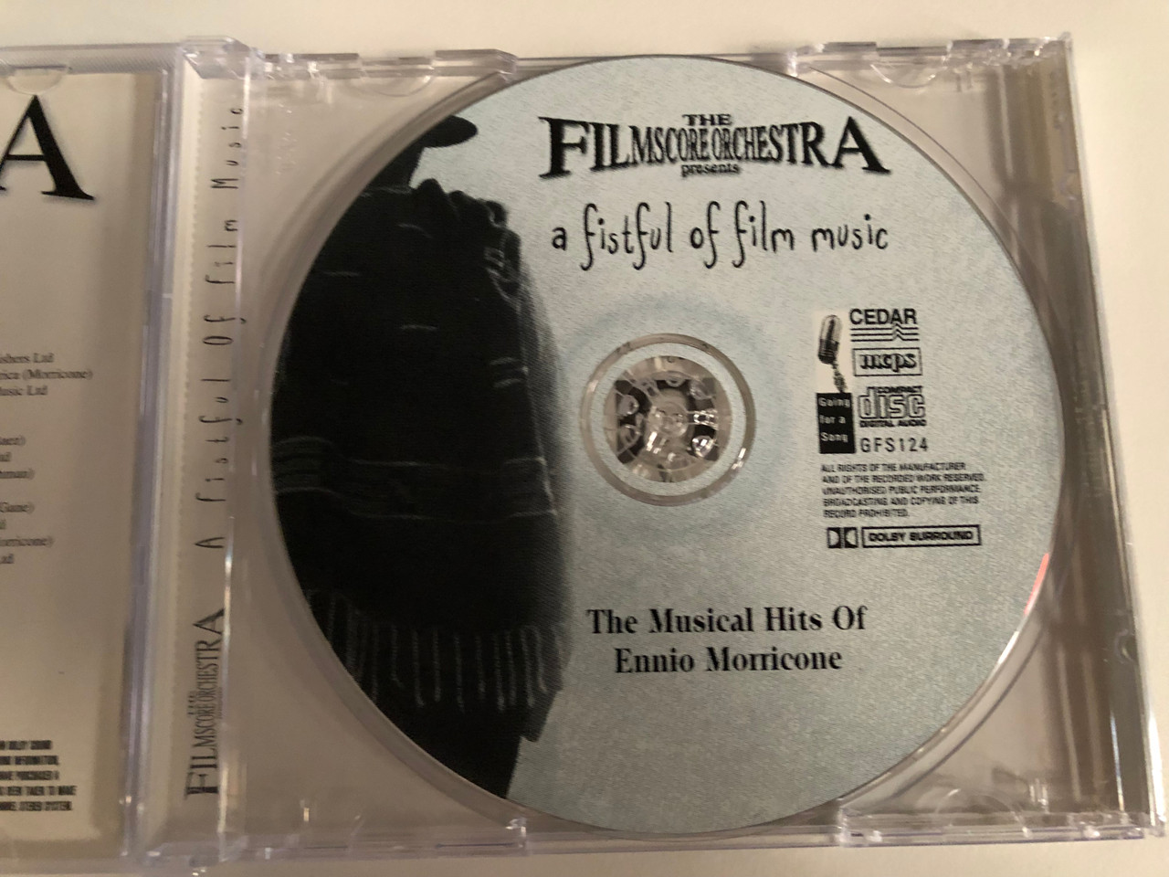 https://cdn10.bigcommerce.com/s-62bdpkt7pb/products/0/images/193940/The_Film_Score_Orchestra_A_Fistful_Of_Film_Music_The_Musical_Hits_Of_Ennio_Morricone_The_Good_The_Bad_And_The_Ugly_Once_Upon_A_Time_In_The_West_A_Fistful_Of_Dollars_Chi_Mai_and_man_4__93201.1633333424.1280.1280.JPG?c=2&_gl=1*179tgij*_ga*MjA2NTIxMjE2MC4xNTkwNTEyNTMy*_ga_WS2VZYPC6G*MTYzMzMzMDQyMy4xMTEuMS4xNjMzMzMzMDc0LjEy