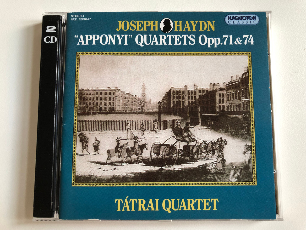 https://cdn10.bigcommerce.com/s-62bdpkt7pb/products/0/images/193992/Joseph_Haydn_-_Apponyi_Quartets_Op.71_74_-_Ttrai_Quartet_Hungaroton_Classic_2x_Audio_CD_1994_Stereo_HCD_12246-47_1__20117.1633339101.1280.1280.JPG?c=2&_gl=1*13m0ujl*_ga*MjA2NTIxMjE2MC4xNTkwNTEyNTMy*_ga_WS2VZYPC6G*MTYzMzMzMDQyMy4xMTEuMS4xNjMzMzM5MDg3LjYw