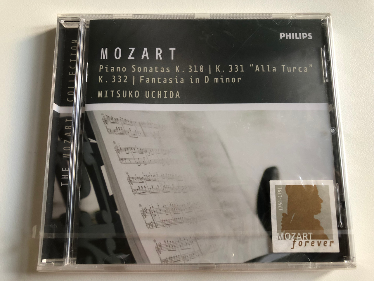 https://cdn10.bigcommerce.com/s-62bdpkt7pb/products/0/images/194086/Mozart_-_Piano_Sonatas_K._310_K._331_Alla_Turca_K._332_Fantasia_In_D_Minor_-_Mitsuko_Uchida_The_Mozart_Collection_Philips_Audio_CD_00289_475_7055_1__92089.1633368734.1280.1280.JPG?c=2&_gl=1*15v6ghb*_ga*MjA2NTIxMjE2MC4xNTkwNTEyNTMy*_ga_WS2VZYPC6G*MTYzMzM2NjE5MC4xMTMuMS4xNjMzMzY4MzkwLjMx