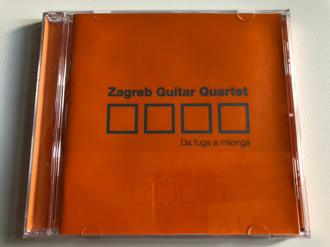 https://cdn10.bigcommerce.com/s-62bdpkt7pb/products/0/images/194145/Zagreb_Guitar_Quartet_Da_Fuga_A_Milonga_HRT_-_Hrvatska_Radiotelevizija_Audio_CD_2005_3859891118007_1__31099.1633417497.1280.1280.JPG?c=2&_gl=1*148a6i8*_ga*MjA2NTIxMjE2MC4xNTkwNTEyNTMy*_ga_WS2VZYPC6G*MTYzMzQxMjA1Ny4xMTQuMS4xNjMzNDE3NDA5LjIy