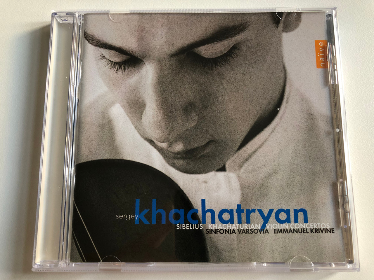https://cdn10.bigcommerce.com/s-62bdpkt7pb/products/0/images/194152/Sergey_Khachatryan_-_Sibelius_Khachaturian_-_Violin_Concertos_Sinfonia_Varsovia_Emmanuel_Krivine_Nave_Audio_CD_2003_V_4959_1__09068.1633419448.1280.1280.JPG?c=2&_gl=1*r3k4lg*_ga*MjA2NTIxMjE2MC4xNTkwNTEyNTMy*_ga_WS2VZYPC6G*MTYzMzQxMjA1Ny4xMTQuMS4xNjMzNDE5MTg2LjUx