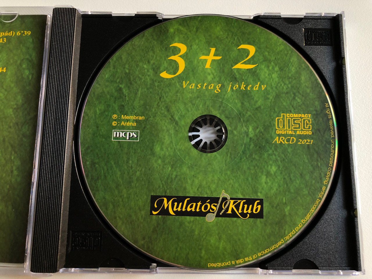 https://cdn10.bigcommerce.com/s-62bdpkt7pb/products/0/images/194668/3_2_-_Vastag_jokedy_-_Mulatos_Klub_Arna_Holding_Audio_CD_2003_ARCD_2021_3__06564.1633596754.1280.1280.JPG?c=2&_gl=1*avcilf*_ga*MjA2NTIxMjE2MC4xNTkwNTEyNTMy*_ga_WS2VZYPC6G*MTYzMzU4ODI4NS4xMTcuMS4xNjMzNTk2NjEzLjE5