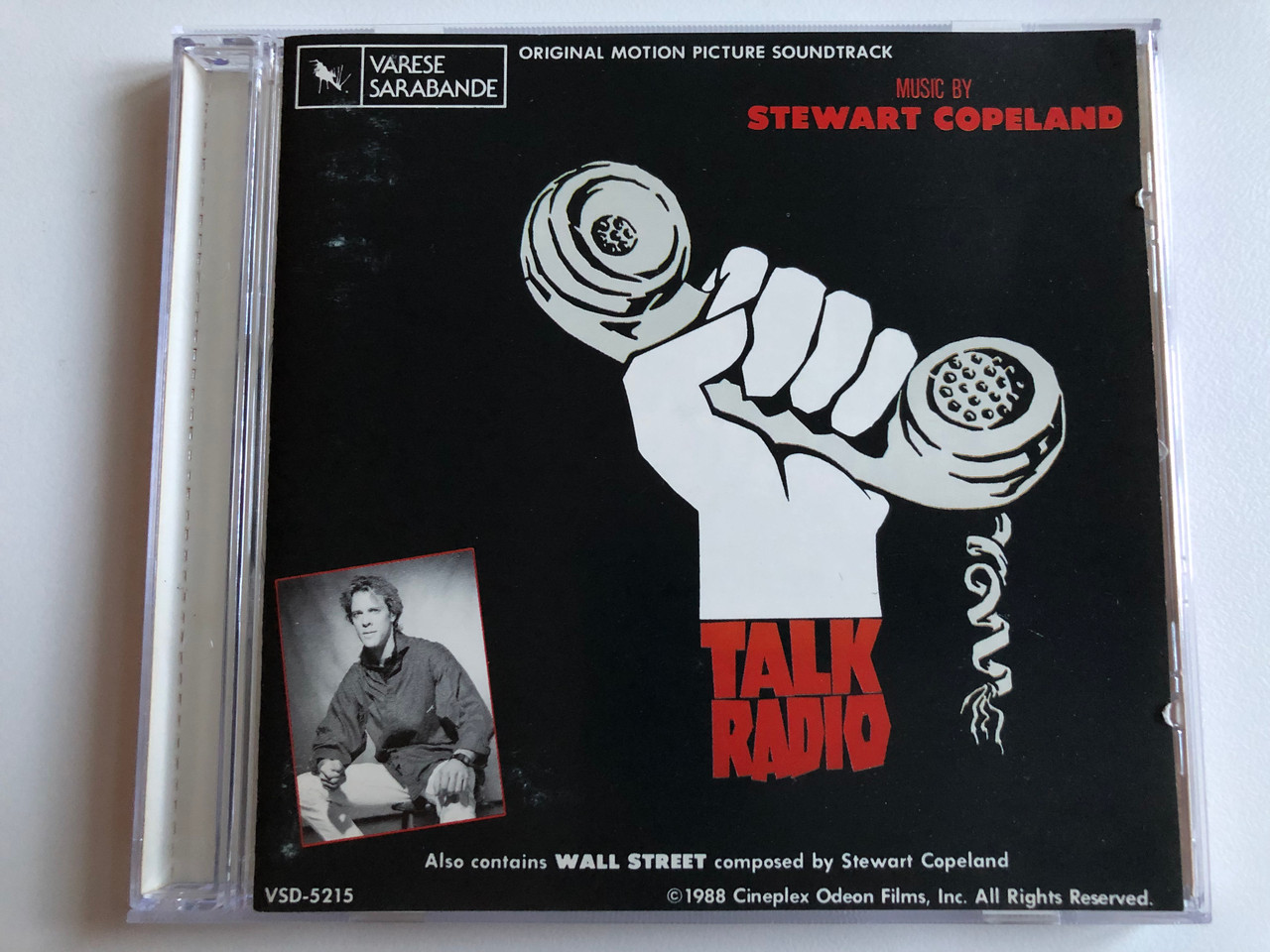 https://cdn10.bigcommerce.com/s-62bdpkt7pb/products/0/images/194851/Music_by_Stewart_Copeland_Talk_Radio_Original_Motion_Picture_Soundtrack_Also_contains_Wall_Street_composed_by_Stewart_Copeland_Varse_Sarabande_Audio_CD_1988_VSD-5215_1__68246.1633684328.1280.1280.JPG?c=2&_gl=1*d5coe*_ga*MjA2NTIxMjE2MC4xNTkwNTEyNTMy*_ga_WS2VZYPC6G*MTYzMzY3NDQ0My4xMjAuMS4xNjMzNjg0MTEwLjM4