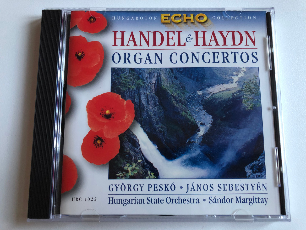 https://cdn10.bigcommerce.com/s-62bdpkt7pb/products/0/images/194860/Handel_Haydn_-_Organ_Concertos_Gyrgy_Pesk_Jnos_Sebestyn_Hungarian_State_Orchestra_Sndor_Margittay_Hungaroton_Echo_Collection_Hungaroton_Classic_Audio_CD_1999_Stereo_HRC_1022_1__82999.1633685126.1280.1280.JPG?c=2&_gl=1*lwpch*_ga*MjA2NTIxMjE2MC4xNTkwNTEyNTMy*_ga_WS2VZYPC6G*MTYzMzY3NDQ0My4xMjAuMS4xNjMzNjg0ODM4LjM5
