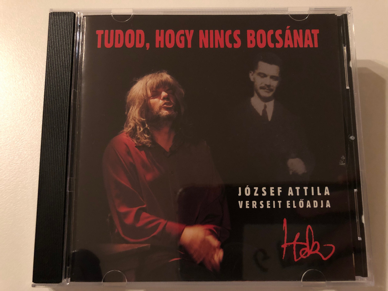 https://cdn10.bigcommerce.com/s-62bdpkt7pb/products/0/images/195199/Tudod_hogy_nincs_bocsnat_-_Hobo_Jozsef_Attila_Verseit_Eloadja_H-Blues_Kft._Audio_CD_2010_H-06001_1__59863.1634022884.1280.1280.JPG?c=2&_gl=1*wskhci*_ga*MjA2NTIxMjE2MC4xNTkwNTEyNTMy*_ga_WS2VZYPC6G*MTYzNDAxNTU4Mi4xMjMuMS4xNjM0MDIyNjU2LjIz