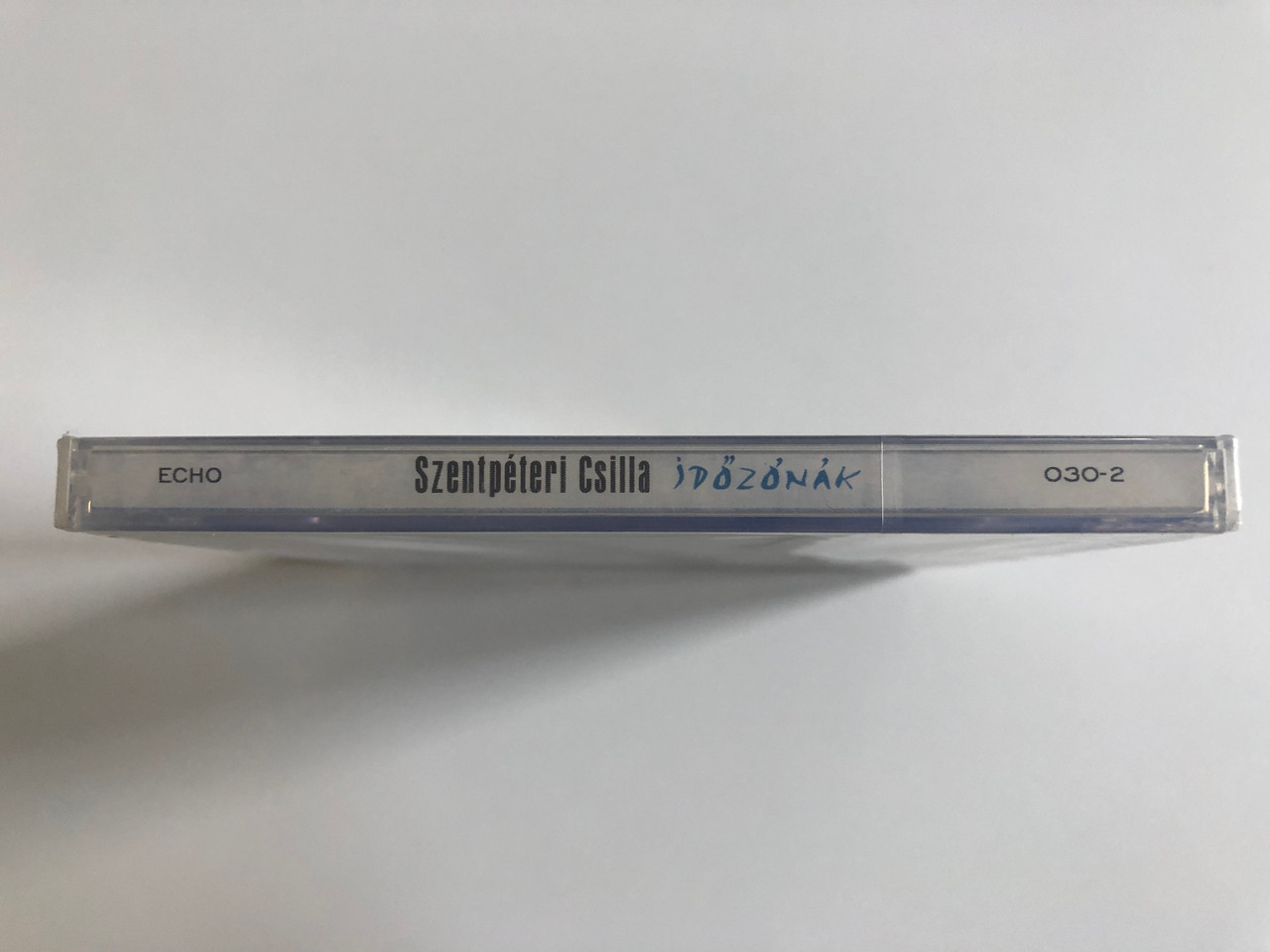 https://cdn10.bigcommerce.com/s-62bdpkt7pb/products/0/images/195224/Szentpteri_Csilla_Idznk_Timezones_Echo_Records_Audio_CD_2003_030-2_3__07426.1634027050.1280.1280.JPG?c=2&_gl=1*1xlwqaf*_ga*MjA2NTIxMjE2MC4xNTkwNTEyNTMy*_ga_WS2VZYPC6G*MTYzNDAxNTU4Mi4xMjMuMS4xNjM0MDI2ODc0LjEx