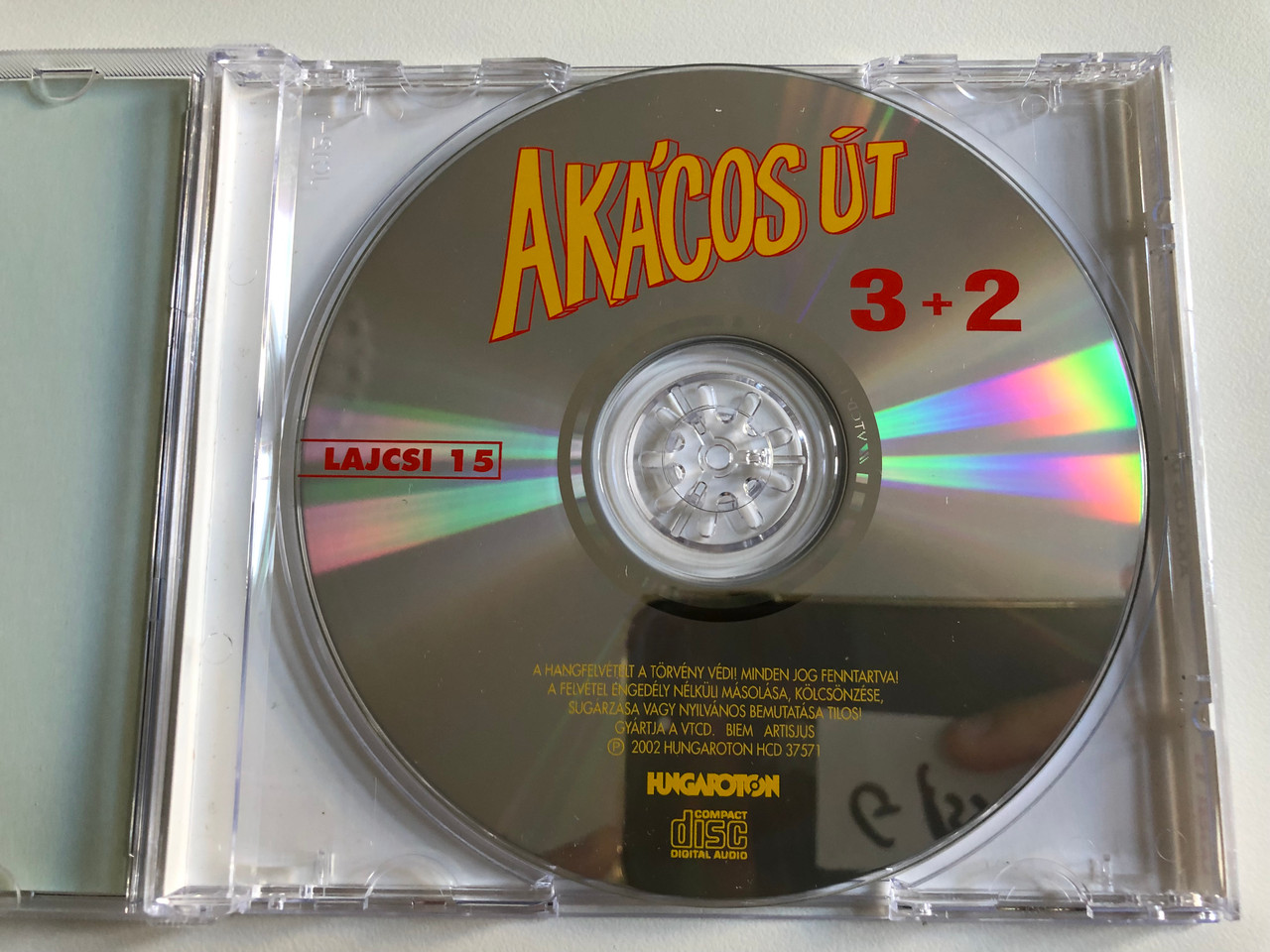 https://cdn10.bigcommerce.com/s-62bdpkt7pb/products/0/images/195408/3_2_-_Akacos_Ut_Lagzi_Lajcsi_15_Mulatos_slagerek_a_notak_Hungaroton_Audio_CD_2002_HCD_37571_3__22355.1634057338.1280.1280.JPG?c=2&_gl=1*1pa5ko6*_ga*MjA2NTIxMjE2MC4xNTkwNTEyNTMy*_ga_WS2VZYPC6G*MTYzNDA1Njg1OC4xMjQuMS4xNjM0MDU2OTk1LjUy