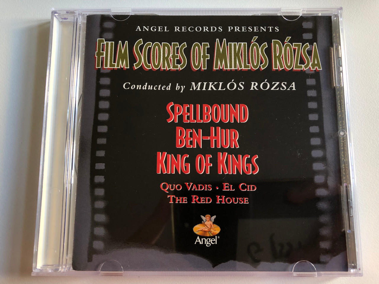 https://cdn10.bigcommerce.com/s-62bdpkt7pb/products/0/images/195559/Angel_Records_Presents_Film_Scores_Of_Mikls_Rzsa_-_Conducted_by_Mikls_Rzsa_Spellbound_Ben-Hur_King_Of_Kings_Quo_Vadis_El_Cid_The_Red_House_Angel_Records_Audio_CD_1996_Stereo_Mono_1__64387.1634109850.1280.1280.JPG?c=2&_gl=1*8bhh0b*_ga*MjA2NTIxMjE2MC4xNTkwNTEyNTMy*_ga_WS2VZYPC6G*MTYzNDA5OTIwNy4xMjUuMS4xNjM0MTA5NDYyLjE.