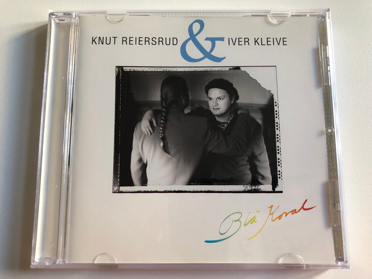 https://cdn10.bigcommerce.com/s-62bdpkt7pb/products/0/images/195576/Knut_Reiersrud_Iver_Kleive_Bl_Koral_Kirkelig_Kulturverksted_Audio_CD_1991_FXCD_106_1__80817.1634112528.1280.1280.JPG?c=2&_gl=1*2h5v0p*_ga*MjA2NTIxMjE2MC4xNTkwNTEyNTMy*_ga_WS2VZYPC6G*MTYzNDA5OTIwNy4xMjUuMS4xNjM0MTEyMzczLjU5