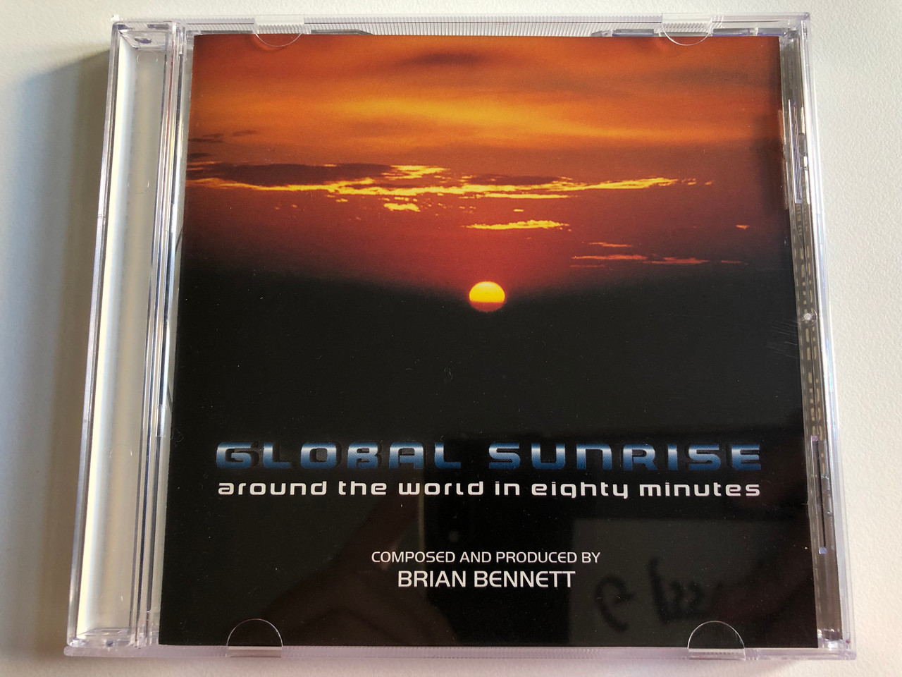 https://cdn10.bigcommerce.com/s-62bdpkt7pb/products/0/images/195581/Global_Sunrise_Around_The_World_In_Eighty_Minutes_-_Composed_and_Produced_by_Brian_Bennett_Oceandeep_Soundtracks_Audio_CD_1997_OCD002_1__57100.1634112805.1280.1280.JPG?c=2&_gl=1*seeb16*_ga*MjA2NTIxMjE2MC4xNTkwNTEyNTMy*_ga_WS2VZYPC6G*MTYzNDA5OTIwNy4xMjUuMS4xNjM0MTEyNjkwLjM2