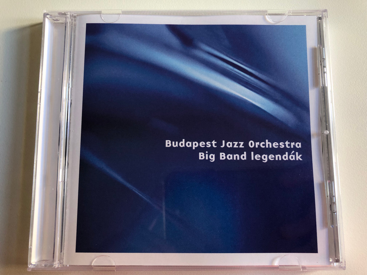 https://cdn10.bigcommerce.com/s-62bdpkt7pb/products/0/images/195698/Budapest_Jazz_Orchestra_-_Big_Band_legendak_Audio_CD_1__21811.1634191062.1280.1280.JPG?c=2&_gl=1*1nop1r0*_ga*MjA2NTIxMjE2MC4xNTkwNTEyNTMy*_ga_WS2VZYPC6G*MTYzNDE4MzI0OC4xMjYuMS4xNjM0MTkwNzk4LjEy