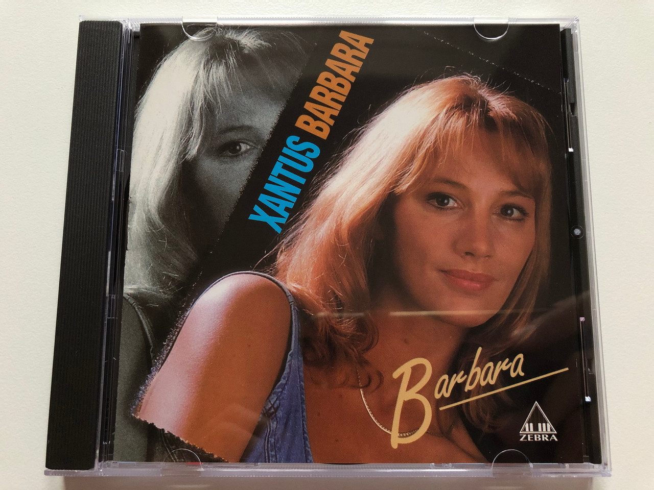 https://cdn10.bigcommerce.com/s-62bdpkt7pb/products/0/images/196187/Xantus_Barbara_Barbara_Zebra_Audio_CD_1995_529449-2_1__54126.1634578630.1280.1280.JPG?c=2&_gl=1*1dxvht3*_ga*MjA2NTIxMjE2MC4xNTkwNTEyNTMy*_ga_WS2VZYPC6G*MTYzNDU3MzEwMy4xMzEuMS4xNjM0NTc4NDA2LjI3