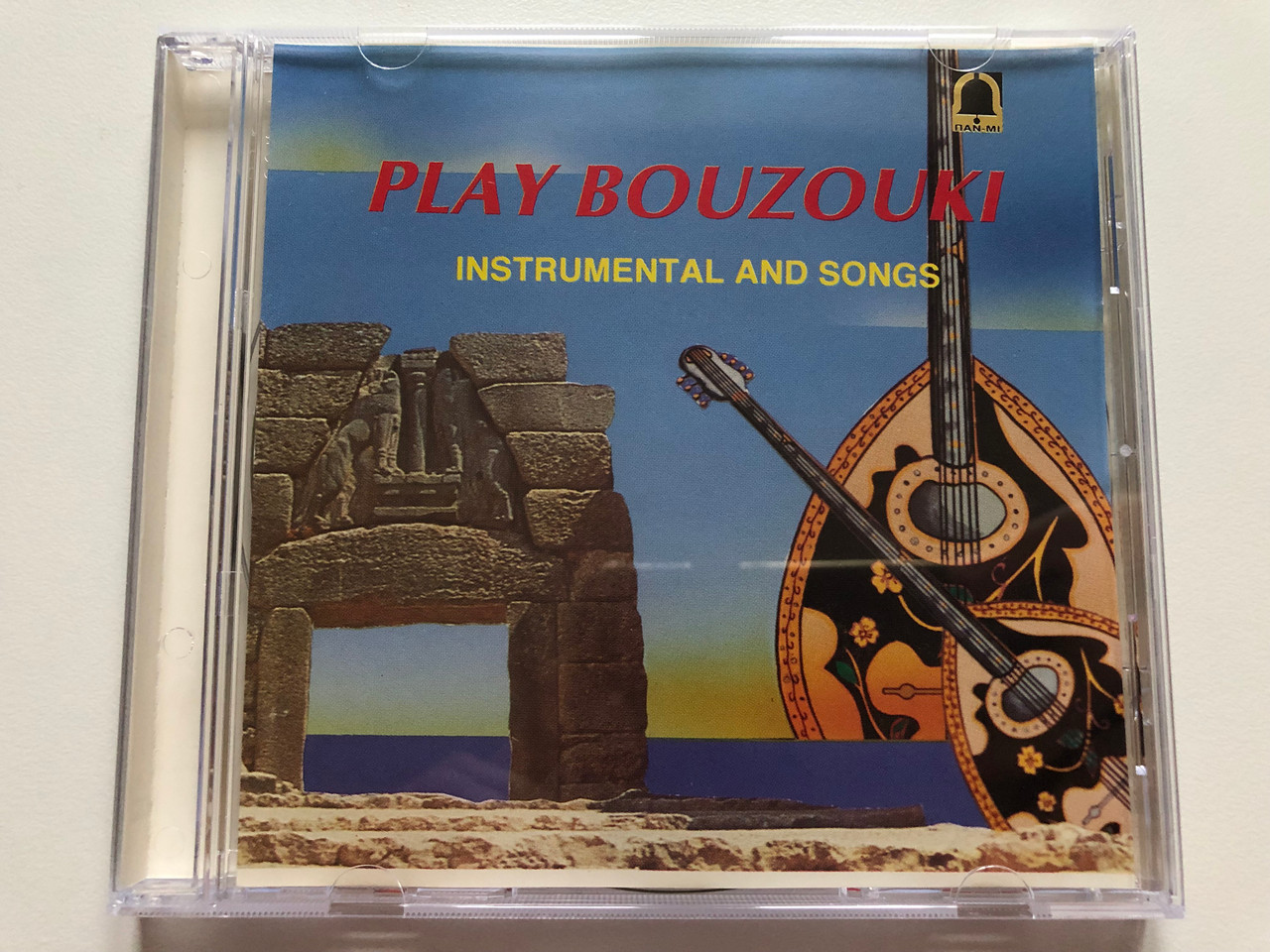 https://cdn10.bigcommerce.com/s-62bdpkt7pb/products/0/images/196202/Play_Bouzouki_-_Instrumental_And_Songs_-_Audio_CD_1997_Stereo_CD_1__11075.1634579372.1280.1280.JPG?c=2&_gl=1*ulvb3k*_ga*MjA2NTIxMjE2MC4xNTkwNTEyNTMy*_ga_WS2VZYPC6G*MTYzNDU3MzEwMy4xMzEuMS4xNjM0NTc5MjEyLjQy