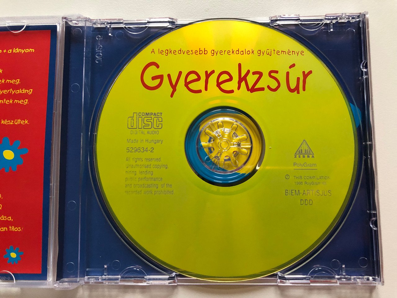 https://cdn10.bigcommerce.com/s-62bdpkt7pb/products/0/images/196238/A_legkedvesebb_gyerekdalok_gyujtemenye_-_Gyerekzsur_-_a_melynek_vendegei_Miki_Mano_Kucko-Macko_Tipi_Tapi_Dino_es_a_tobbeik..._Kivancsi-Fancsi_Halasz_Judit_Tipi_Tapi_Dino_Papp_Rita_Po_3__96309.1634582326.1280.1280.JPG?c=2&_gl=1*9358y4*_ga*MjA2NTIxMjE2MC4xNTkwNTEyNTMy*_ga_WS2VZYPC6G*MTYzNDU3MzEwMy4xMzEuMS4xNjM0NTgyMzE5LjYw