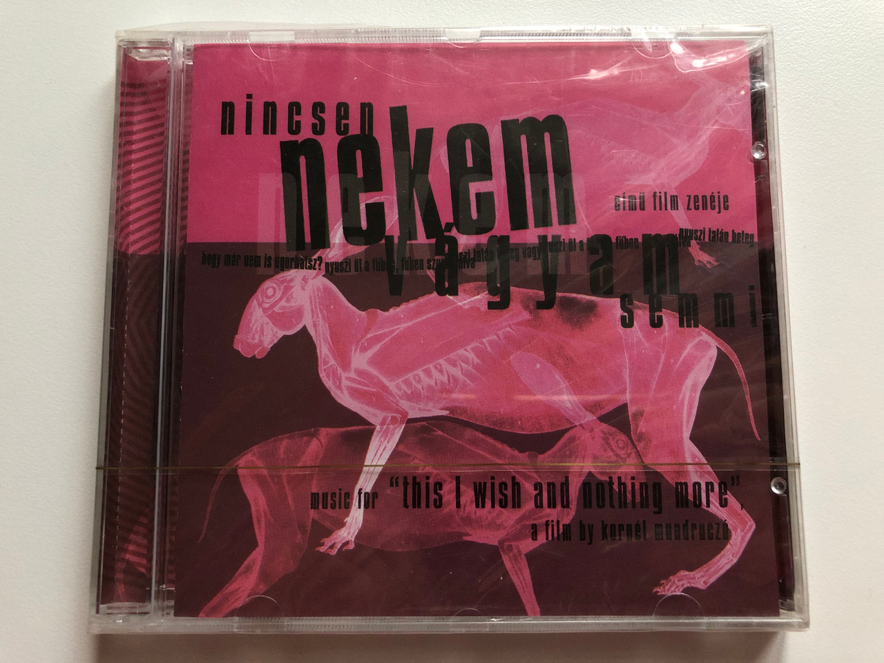https://cdn10.bigcommerce.com/s-62bdpkt7pb/products/0/images/196286/Nincsen_Nekem_Vgyam_Semmi_-_Music_for_This_I_Wish_and_nothing_more_a_film_by_Kornel_Mundruczo_TwelveTones_Records_Audio_CD_2001_001-012001_1__93296.1634662206.1280.1280.JPG?c=2&_gl=1*1lph04h*_ga*MjA2NTIxMjE2MC4xNTkwNTEyNTMy*_ga_WS2VZYPC6G*MTYzNDY1NzY0NS4xMzIuMS4xNjM0NjYxNDYxLjU3