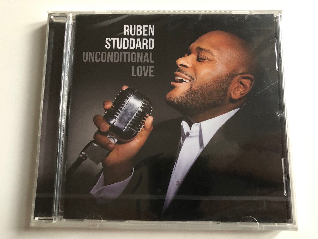 https://cdn10.bigcommerce.com/s-62bdpkt7pb/products/0/images/196352/Ruben_Studdard_Unconditional_Love_Verve_Records_Audio_CD_2014_0602537606177_1__94952.1634670845.1280.1280.JPG?c=2&_gl=1*1jo2q7i*_ga*MjA2NTIxMjE2MC4xNTkwNTEyNTMy*_ga_WS2VZYPC6G*MTYzNDY1NzY0NS4xMzIuMS4xNjM0NjcwNzE0LjM2