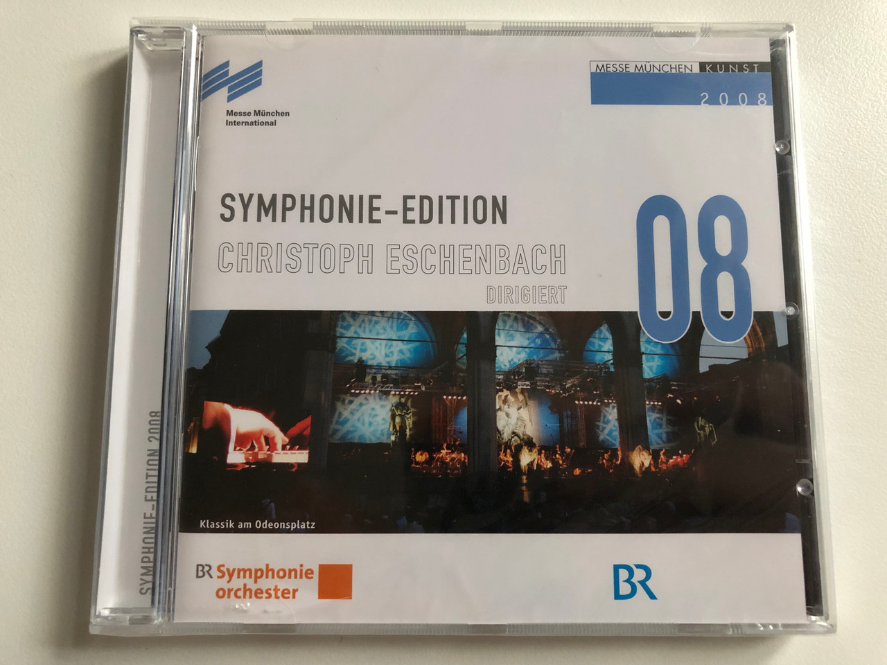 https://cdn10.bigcommerce.com/s-62bdpkt7pb/products/0/images/196397/Symphonie-Edition_08_-_Christoph_Eschenbach_dirigent_Audio_CD_1__24645.1634742509.1280.1280.JPG?c=2&_gl=1*1d7l2z4*_ga*MjA2NTIxMjE2MC4xNTkwNTEyNTMy*_ga_WS2VZYPC6G*MTYzNDczNzkzNS4xMzMuMS4xNjM0NzQyMzk5LjUy