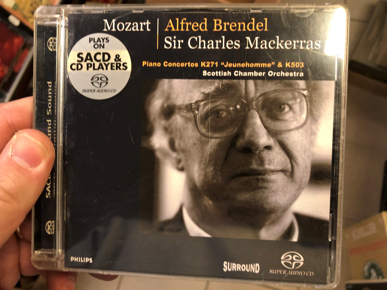 https://cdn10.bigcommerce.com/s-62bdpkt7pb/products/0/images/196419/Mozart_-_Alfred_Brendel_-_Sir_Charles_Mackerras_Piano_Concertos_K271_Jeunehomme_K503_Scottish_Chamber_Orchestra_Philips_Audio_CD_2002_470_616-2_1__16990.1634745247.1280.1280.JPG?c=2&_gl=1*l4punn*_ga*MjA2NTIxMjE2MC4xNTkwNTEyNTMy*_ga_WS2VZYPC6G*MTYzNDczNzkzNS4xMzMuMS4xNjM0NzQ1MDkzLjMy