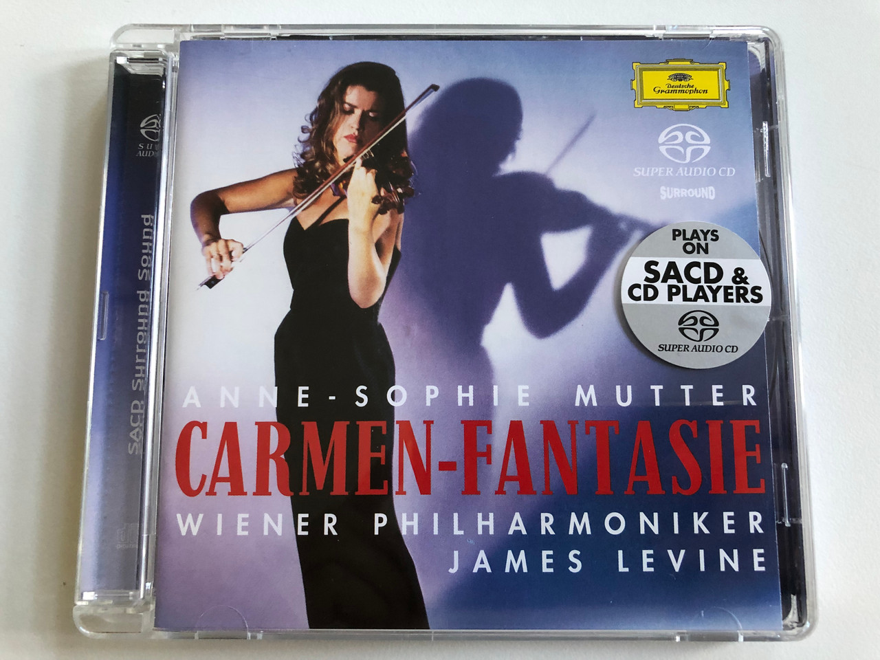 https://cdn10.bigcommerce.com/s-62bdpkt7pb/products/0/images/196474/Anne-Sophie_Mutter_-_Carmen-Fantasie_Wiener_Philharmoniker_James_Levine_Deutsche_Grammophon_Audio_CD_2005_Stereo_00289_477_5721_1__14805.1634750983.1280.1280.JPG?c=2&_gl=1*1xjhvln*_ga*MjA2NTIxMjE2MC4xNTkwNTEyNTMy*_ga_WS2VZYPC6G*MTYzNDczNzkzNS4xMzMuMS4xNjM0NzUwNjk3LjM5