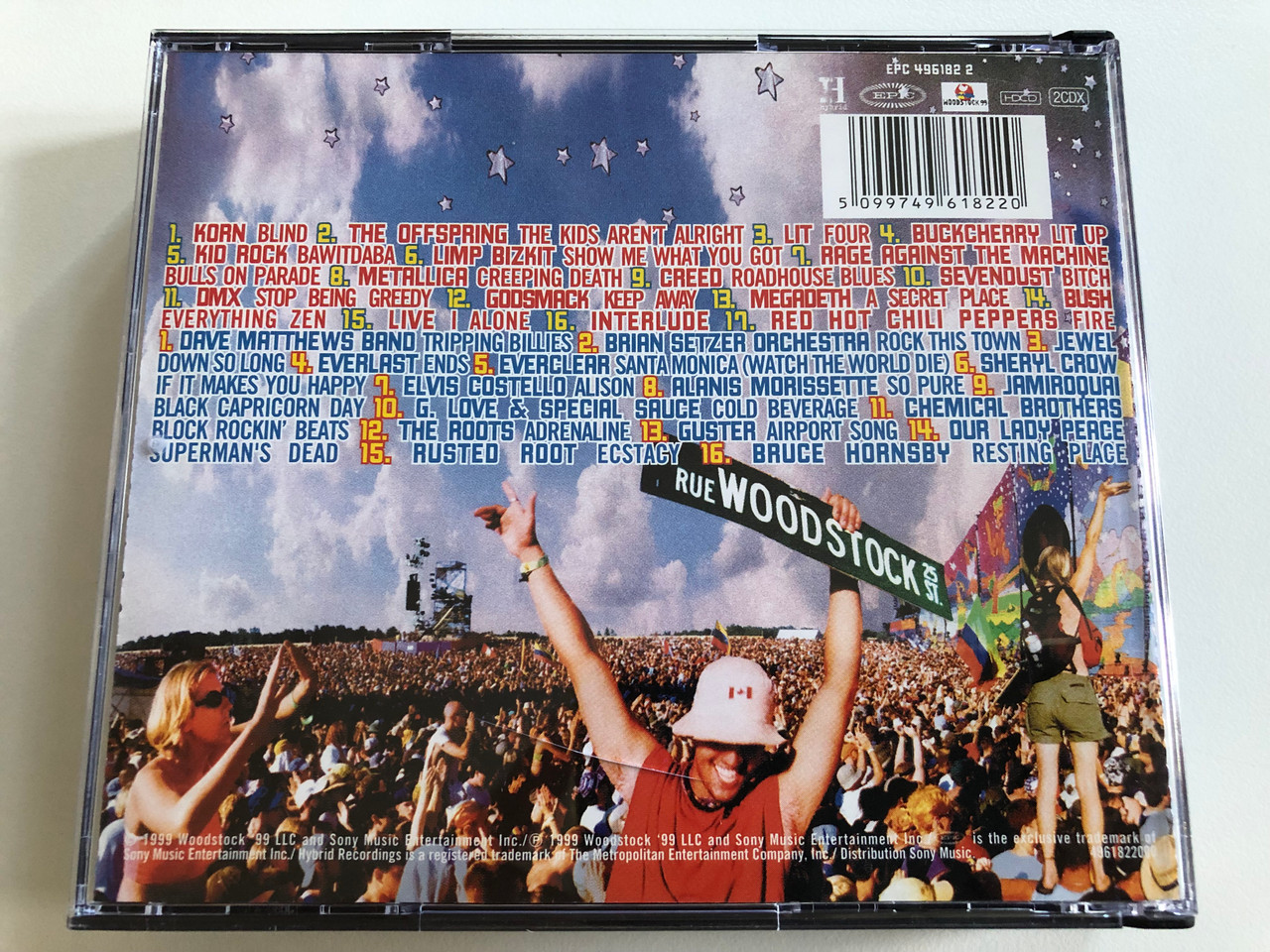 https://cdn10.bigcommerce.com/s-62bdpkt7pb/products/0/images/196505/Woodstock_99_Epic_2x_Audio_CD_1999_496182_2_10__97255.1634753318.1280.1280.JPG?c=2&_gl=1*10i1mtf*_ga*MjA2NTIxMjE2MC4xNTkwNTEyNTMy*_ga_WS2VZYPC6G*MTYzNDczNzkzNS4xMzMuMS4xNjM0NzUzMTg4LjI3