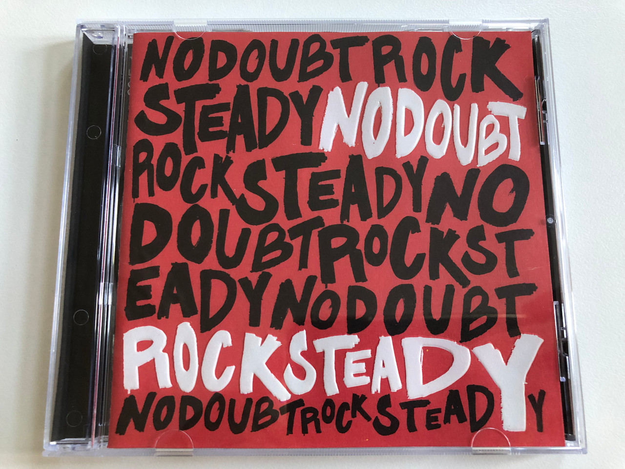 https://cdn10.bigcommerce.com/s-62bdpkt7pb/products/0/images/196566/No_Doubt_Rock_Steady_Interscope_Records_Audio_CD_2001_493_158-2_1__97445.1634835557.1280.1280.JPG?c=2&_gl=1*w5r3y6*_ga*MjA2NTIxMjE2MC4xNTkwNTEyNTMy*_ga_WS2VZYPC6G*MTYzNDgzNTM5OC4xMzUuMS4xNjM0ODM1NTI0LjYw