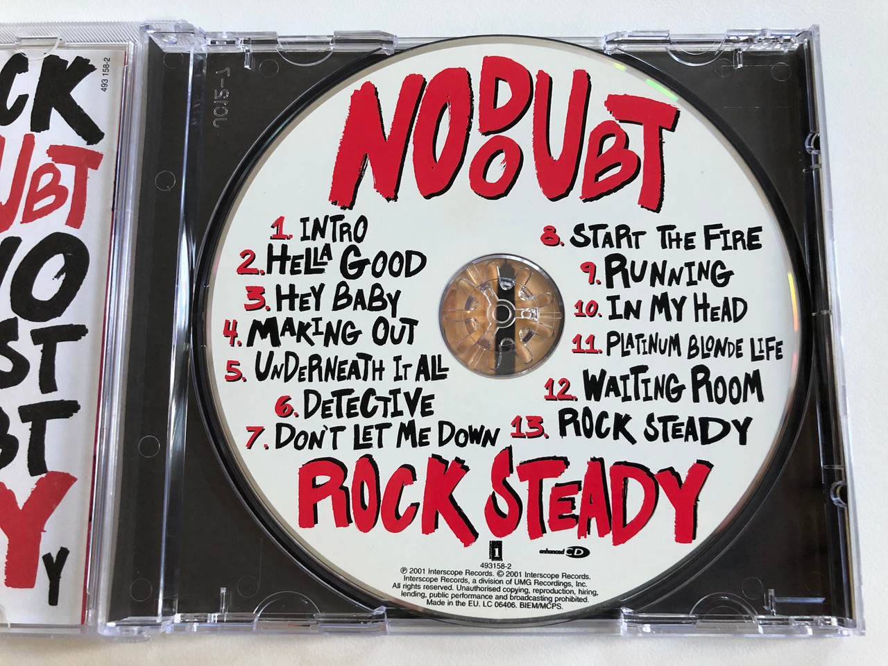 https://cdn10.bigcommerce.com/s-62bdpkt7pb/products/0/images/196567/No_Doubt_Rock_Steady_Interscope_Records_Audio_CD_2001_493_158-2_3__18433.1634835558.1280.1280.JPG?c=2&_gl=1*w5r3y6*_ga*MjA2NTIxMjE2MC4xNTkwNTEyNTMy*_ga_WS2VZYPC6G*MTYzNDgzNTM5OC4xMzUuMS4xNjM0ODM1NTI0LjYw