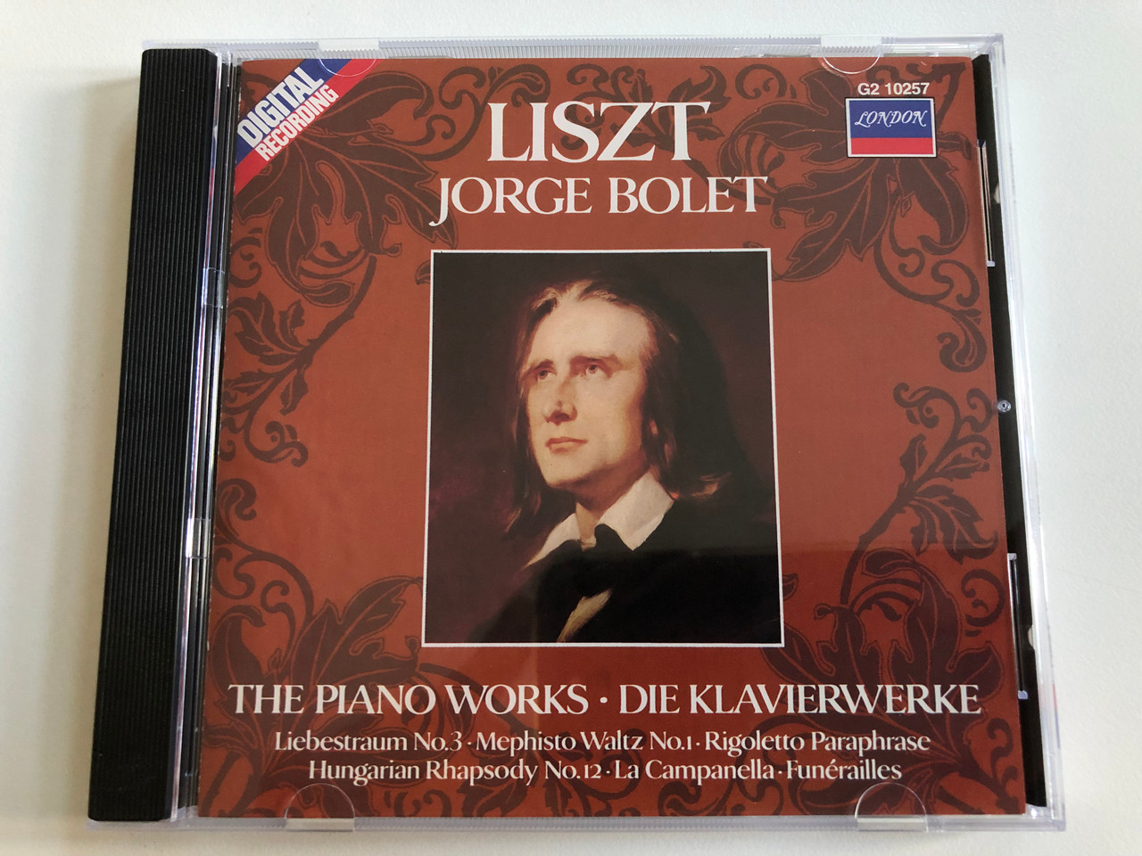 https://cdn10.bigcommerce.com/s-62bdpkt7pb/products/0/images/196646/Liszt_-_Jorge_Bolet_-_The_Piano_Works_-_Die_Klavierwerke_Liebestraum_No._3_Mephisto_Waltz_No._1_Rigoletto_Paraphrase_Hungarian_Rhapsody_No._12_La_Campanella_Funerailles_London_Classics_1__06593.1634843462.1280.1280.JPG?c=2&_gl=1*19p1bas*_ga*MjA2NTIxMjE2MC4xNTkwNTEyNTMy*_ga_WS2VZYPC6G*MTYzNDgzNTM5OC4xMzUuMS4xNjM0ODQzMTkyLjI2