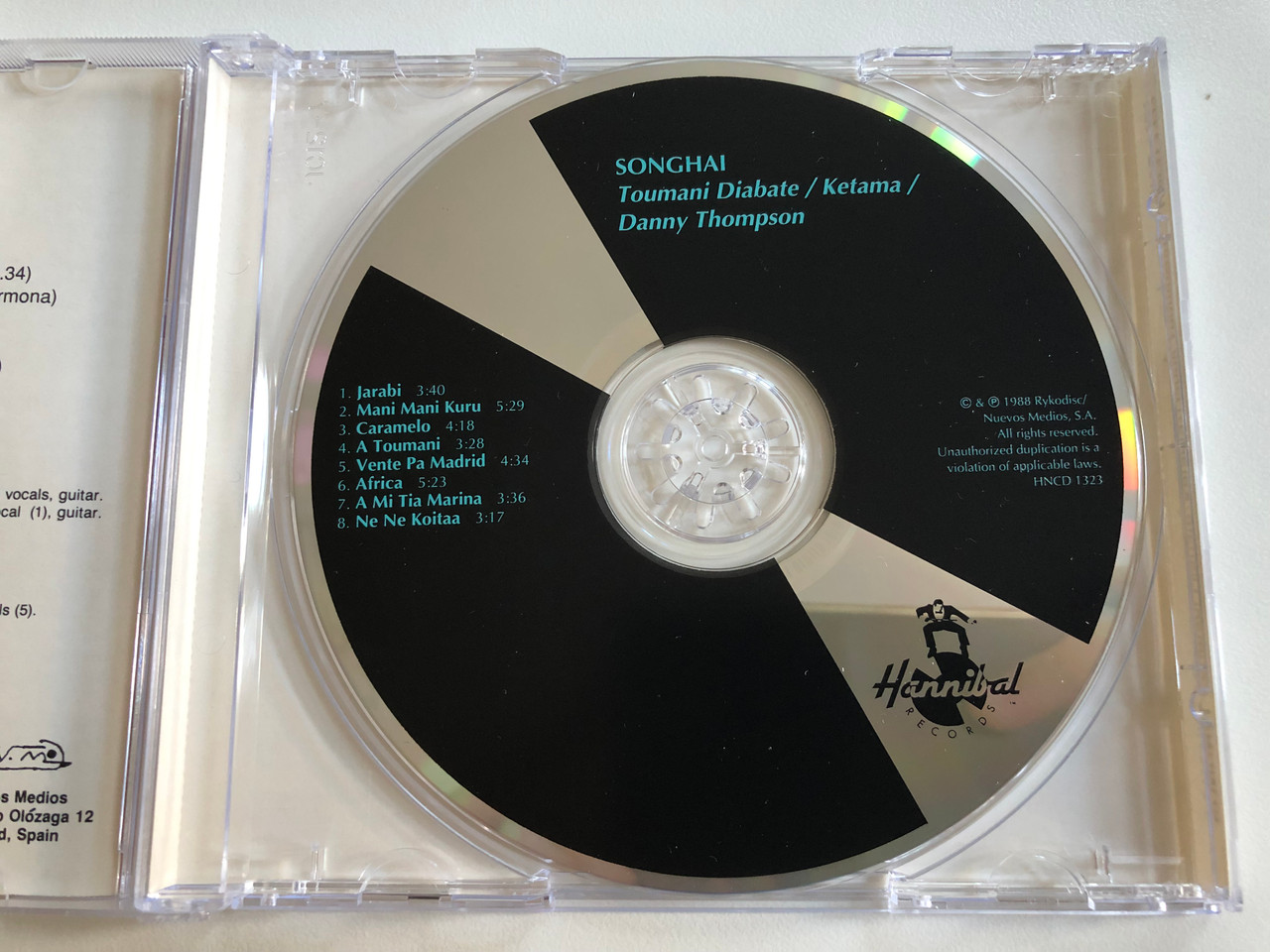 https://cdn10.bigcommerce.com/s-62bdpkt7pb/products/0/images/196695/Songhai_-_Ketama_Toumani_Diabate_Danny_Thompson_Hannibal_Records_Audio_CD_1998_HNCD_1323_3__21576.1634912783.1280.1280.JPG?c=2&_gl=1*19rvmid*_ga*MjA2NTIxMjE2MC4xNTkwNTEyNTMy*_ga_WS2VZYPC6G*MTYzNDkwOTU4OC4xMzcuMS4xNjM0OTEyNDkzLjc.