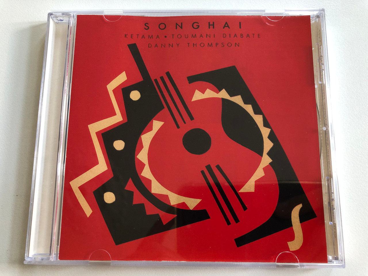 https://cdn10.bigcommerce.com/s-62bdpkt7pb/products/0/images/196696/Songhai_-_Ketama_Toumani_Diabate_Danny_Thompson_Hannibal_Records_Audio_CD_1998_HNCD_1323_1__31077.1634912784.1280.1280.JPG?c=2&_gl=1*19rvmid*_ga*MjA2NTIxMjE2MC4xNTkwNTEyNTMy*_ga_WS2VZYPC6G*MTYzNDkwOTU4OC4xMzcuMS4xNjM0OTEyNDkzLjc.