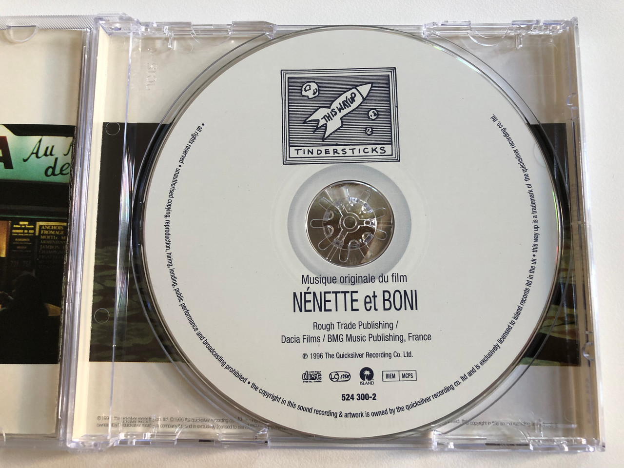https://cdn10.bigcommerce.com/s-62bdpkt7pb/products/0/images/196802/Musique_originale_du_film_-_Nnette_Et_Boni_-_par_tindersticks_This_Way_Up_Audio_CD_1996_524_300-2_3__65683.1635141589.1280.1280.JPG?c=2&_gl=1*1vv2lfm*_ga*MjA2NTIxMjE2MC4xNTkwNTEyNTMy*_ga_WS2VZYPC6G*MTYzNTE0MTM4MC4xMzguMC4xNjM1MTQxMzgwLjYw