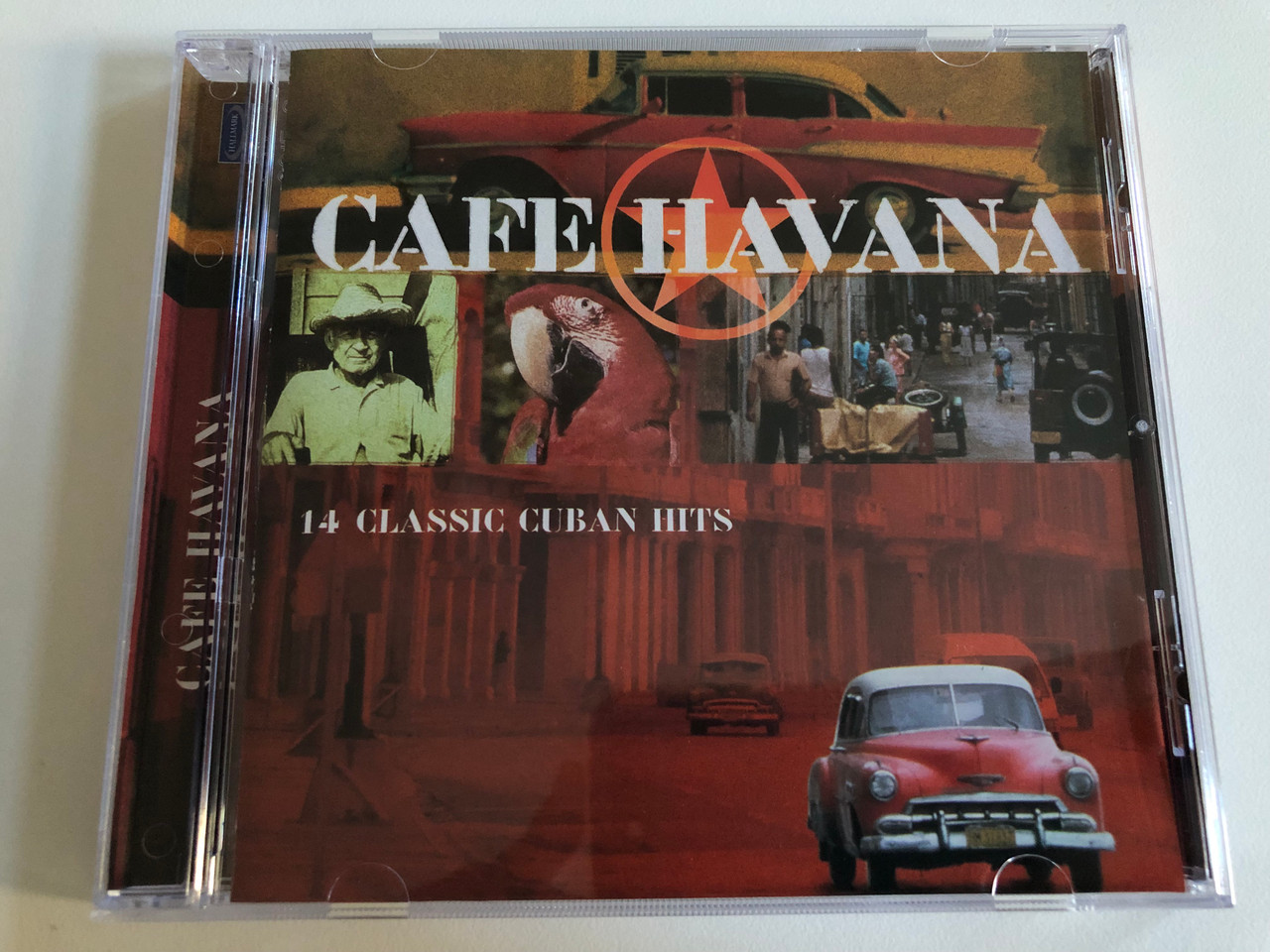 https://cdn10.bigcommerce.com/s-62bdpkt7pb/products/0/images/197121/Cafe_Havana_-_14_Classic_Cuban_Hits_Hallmark_Audio_CD_2002_702662_1__88443.1635312107.1280.1280.JPG?c=2&_gl=1*1m27dll*_ga*MjA2NTIxMjE2MC4xNTkwNTEyNTMy*_ga_WS2VZYPC6G*MTYzNTMxMTg5NC4xNDIuMC4xNjM1MzExODk0LjYw