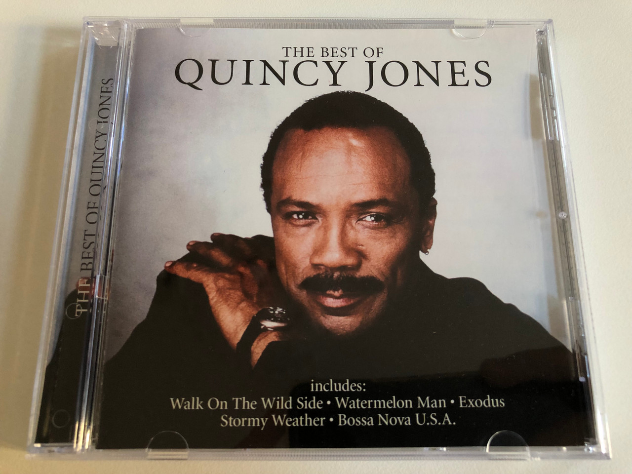 https://cdn10.bigcommerce.com/s-62bdpkt7pb/products/0/images/197135/The_Best_Of_Quincy_Jones_Includes_Walk_On_The_Wild_Side_Watermelon_Man_Exodus_Stormy_Weather_Bossa_Nova_U.S.A._Time_Music_Audio_CD_2005_TMI388_1__93345.1635314252.1280.1280.JPG?c=2&_gl=1*1jjuxjd*_ga*MjA2NTIxMjE2MC4xNTkwNTEyNTMy*_ga_WS2VZYPC6G*MTYzNTMxMTg5NC4xNDIuMS4xNjM1MzEzOTQ5LjU3