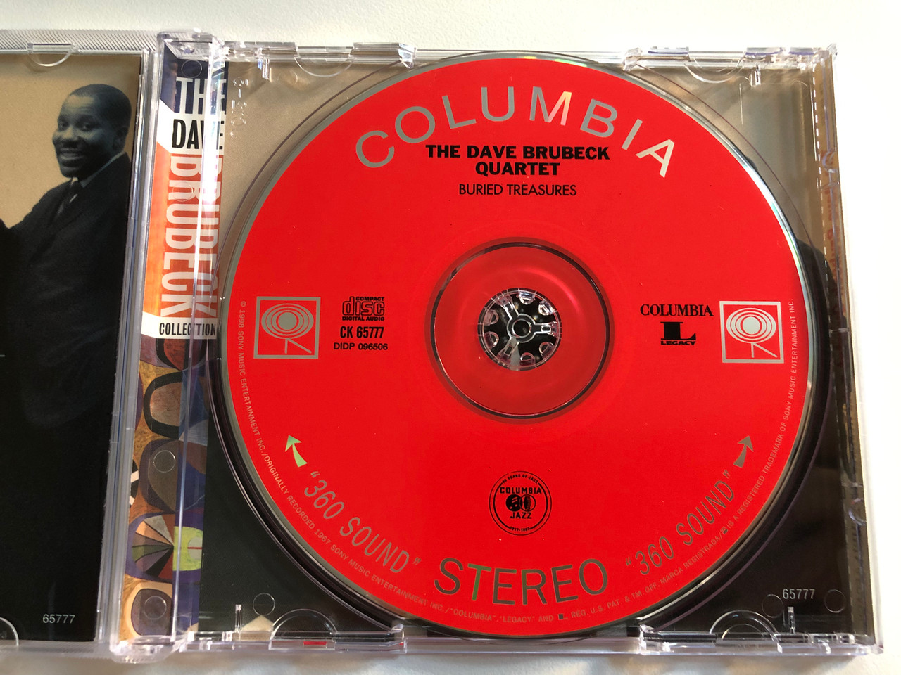 https://cdn10.bigcommerce.com/s-62bdpkt7pb/products/0/images/197471/The_Dave_Brubeck_Quartet_Featuring_Paul_Desmond_Buried_Treasures_Recorded_Live_In_Mexico_City_Columbia_Audio_CD_1998_CK_65777_3__74317.1635441878.1280.1280.JPG?c=2&_gl=1*qevber*_ga*MjA2NTIxMjE2MC4xNTkwNTEyNTMy*_ga_WS2VZYPC6G*MTYzNTQyOTM4MS4xNDUuMS4xNjM1NDQxNjc5LjM0