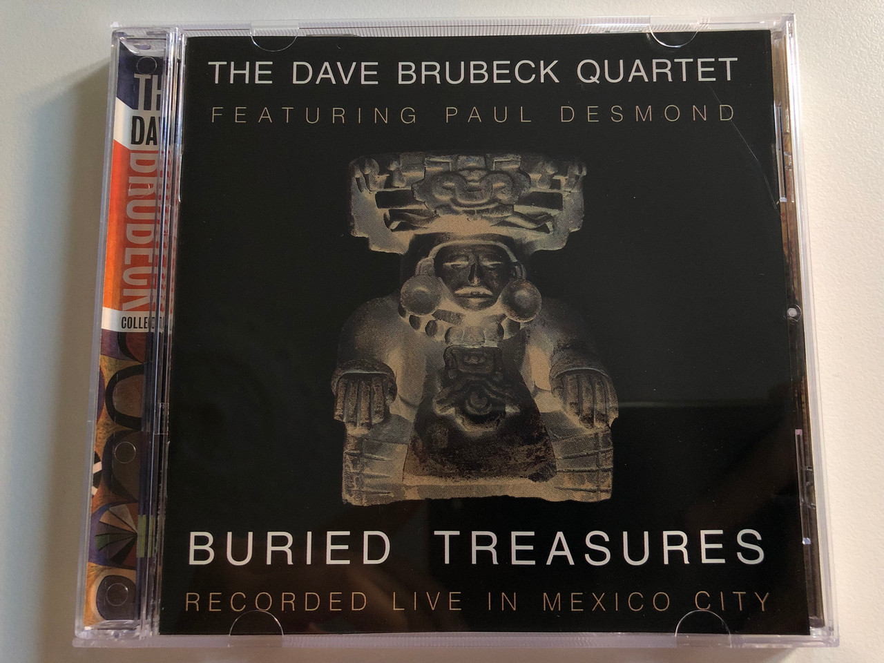 https://cdn10.bigcommerce.com/s-62bdpkt7pb/products/0/images/197475/The_Dave_Brubeck_Quartet_Featuring_Paul_Desmond_Buried_Treasures_Recorded_Live_In_Mexico_City_Columbia_Audio_CD_1998_CK_65777_1__73544.1635441881.1280.1280.JPG?c=2&_gl=1*qevber*_ga*MjA2NTIxMjE2MC4xNTkwNTEyNTMy*_ga_WS2VZYPC6G*MTYzNTQyOTM4MS4xNDUuMS4xNjM1NDQxNjc5LjM0