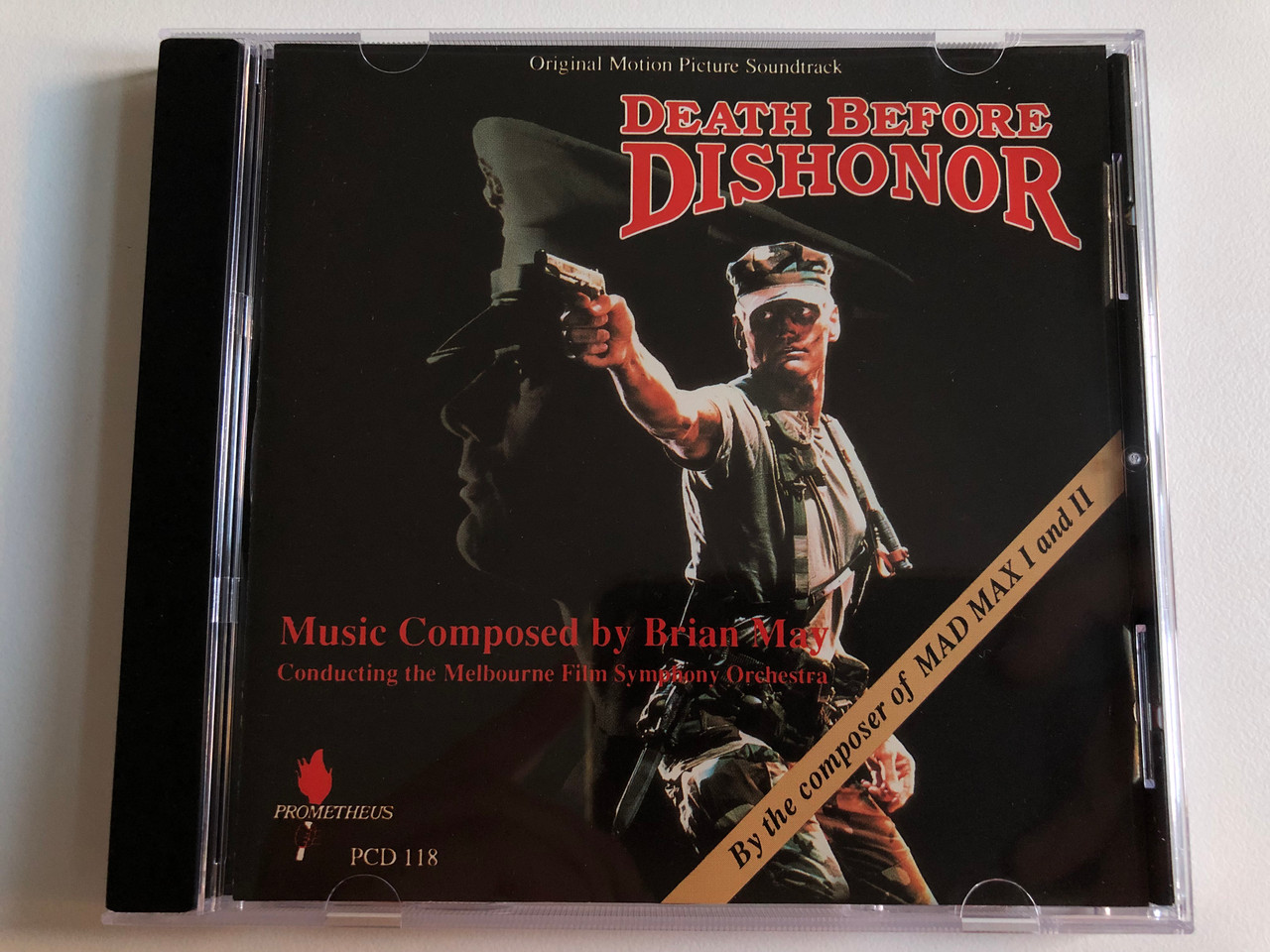 https://cdn10.bigcommerce.com/s-62bdpkt7pb/products/0/images/197497/Death_Before_Dishonor_Original_Motion_Picture_Soundtrack_-_Music_Composed_by_Brian_May_Conducting_the_Melbouurne_Film_Symphony_Orchestra_By_The_composer_of_Mad_Max_I_and_II_Prometheus_Re_1__73819.1635496826.1280.1280.JPG?c=2&_gl=1*7yssgo*_ga*MjA2NTIxMjE2MC4xNTkwNTEyNTMy*_ga_WS2VZYPC6G*MTYzNTQ5NjQyMS4xNDYuMS4xNjM1NDk2NDUwLjMx