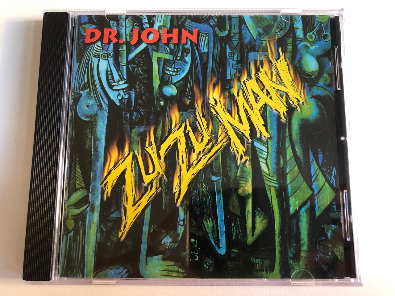 https://cdn10.bigcommerce.com/s-62bdpkt7pb/products/0/images/197572/Dr._John_Zu_Zu_Man_Dressed_To_Kill_Audio_CD_2000_METRO366_1__75056.1635516297.1280.1280.JPG?c=2&_gl=1*46w9f*_ga*MjA2NTIxMjE2MC4xNTkwNTEyNTMy*_ga_WS2VZYPC6G*MTYzNTUxMzc1NC4xNDcuMS4xNjM1NTE2MTk5LjQx