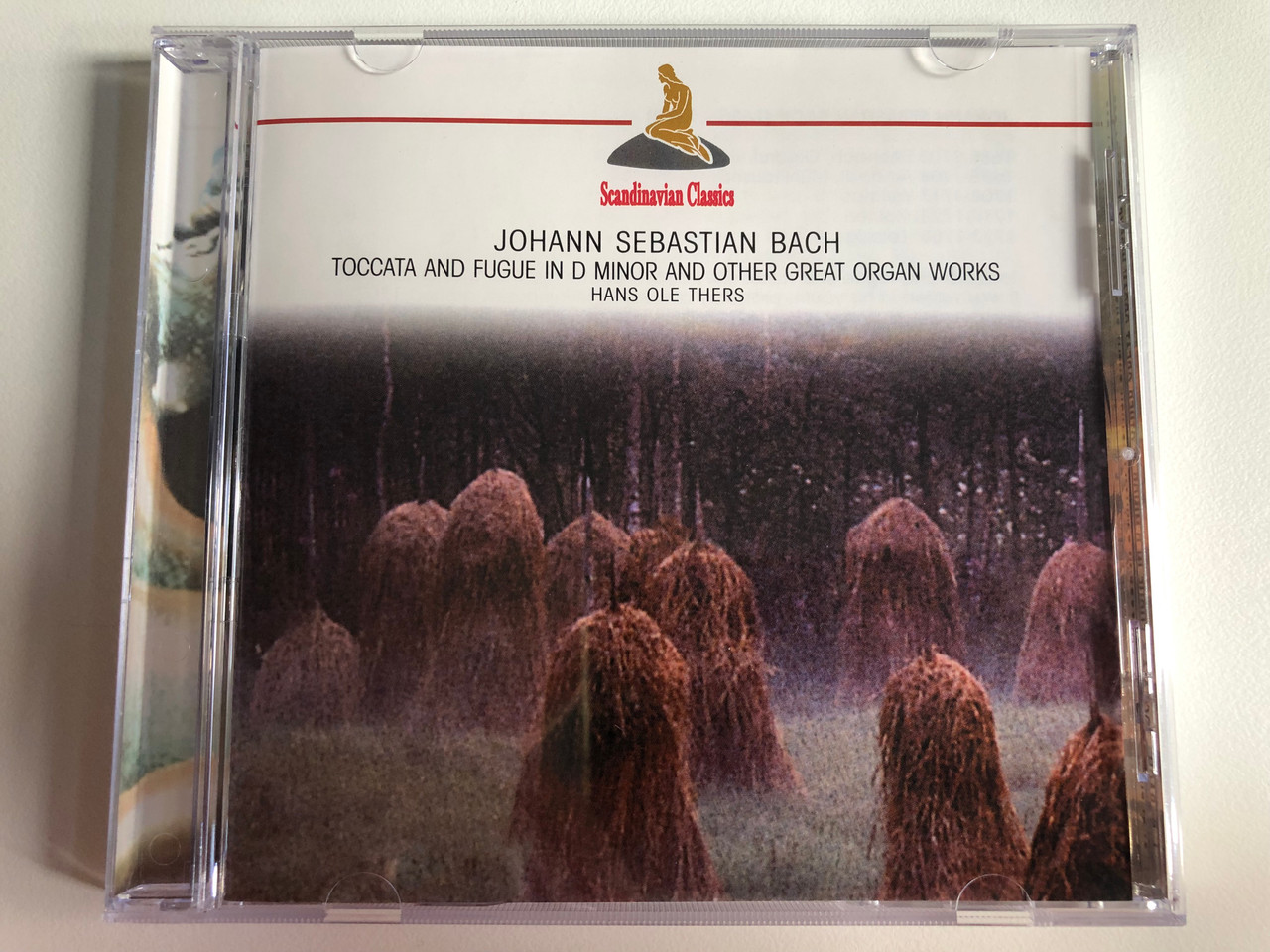 https://cdn10.bigcommerce.com/s-62bdpkt7pb/products/0/images/197762/Johann_Sebastian_Bach_-_Toccata_And_Fugue_In_D-minor_And_Other_Great_Organ_Works_Hans_Ole_Thers_Scandinavian_Classics_Audio_CD_2002_220594-205_1__78937.1635776255.1280.1280.JPG?c=2&_gl=1*abz0z2*_ga*MjA2NTIxMjE2MC4xNTkwNTEyNTMy*_ga_WS2VZYPC6G*MTYzNTc3Mjk2Ni4xNDguMS4xNjM1Nzc1ODYxLjI2
