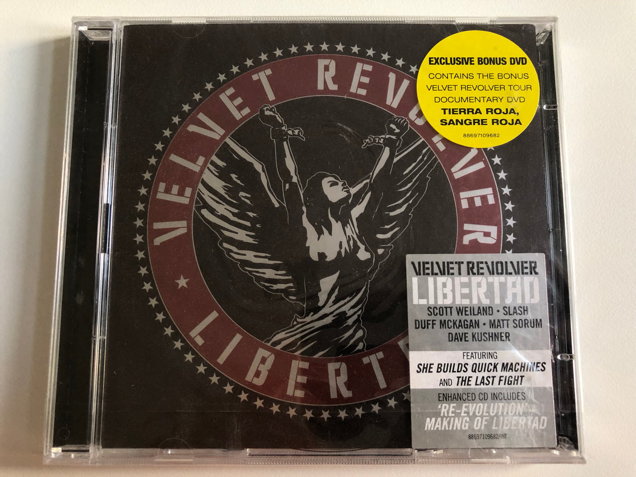 https://cdn10.bigcommerce.com/s-62bdpkt7pb/products/0/images/197797/Velvet_Revolver_Libertad_Scott_Weiland_Slash_Duff_McKagan_Matt_Sorum_Dave_Kushner_Featuring_She_Builds_Quick_Machines_and_The_Last_Fight_Enhanced_CD_Includes_Re-Evolution_Making_Of_1__40540.1635786958.1280.1280.JPG?c=2&_gl=1*hyp6ro*_ga*MjA2NTIxMjE2MC4xNTkwNTEyNTMy*_ga_WS2VZYPC6G*MTYzNTc4NDc2OC4xNTAuMS4xNjM1Nzg2MzY4LjEz