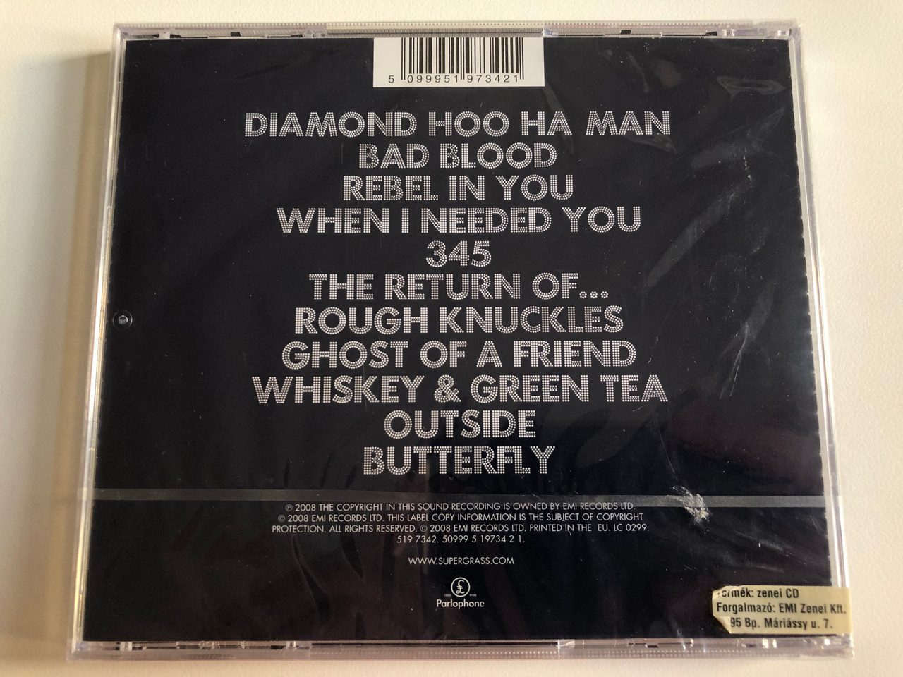 https://cdn10.bigcommerce.com/s-62bdpkt7pb/products/0/images/197809/Supergrass_Diamond_Hoo_Ha_Includes_Bad_Blood_Diamond_Hoo_Ha_Man_and_Rebel_In_You_Parlophone_Audio_CD_2008_519_7342_2__90082.1635789204.1280.1280.JPG?c=2&_gl=1*g88pdt*_ga*MjA2NTIxMjE2MC4xNTkwNTEyNTMy*_ga_WS2VZYPC6G*MTYzNTc4NDc2OC4xNTAuMS4xNjM1Nzg4OTEzLjM1