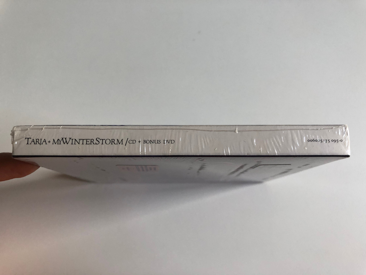 https://cdn10.bigcommerce.com/s-62bdpkt7pb/products/0/images/197822/My_Winter_Storm_-_Tarja_Deluxe_Edition_Incl._3_extra_songs_Bonus_DVD_Featuring_Photo_galerry_making_of_the_video_making_of_the_album_Vertigo_Audio_CD_DVD_2007_006025175_095-0_3__68365.1635793252.1280.1280.JPG?c=2&_gl=1*5ivdvb*_ga*MjA2NTIxMjE2MC4xNTkwNTEyNTMy*_ga_WS2VZYPC6G*MTYzNTc4NDc2OC4xNTAuMS4xNjM1NzkzMDQzLjM2