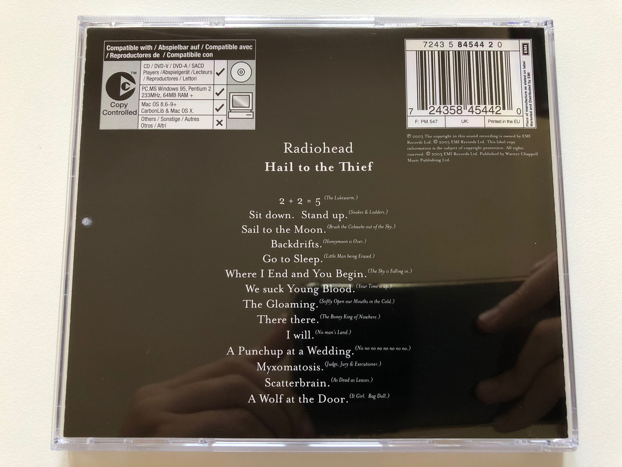 https://cdn10.bigcommerce.com/s-62bdpkt7pb/products/0/images/197926/Radiohead_Hail_To_The_Thief_Parlophone_Audio_CD_2003_724358454420_4__80808.1635873038.1280.1280.JPG?c=2&_gl=1*1flk64o*_ga*MjA2NTIxMjE2MC4xNTkwNTEyNTMy*_ga_WS2VZYPC6G*MTYzNTg2NTA1MS4xNTEuMS4xNjM1ODcyOTI2LjMw