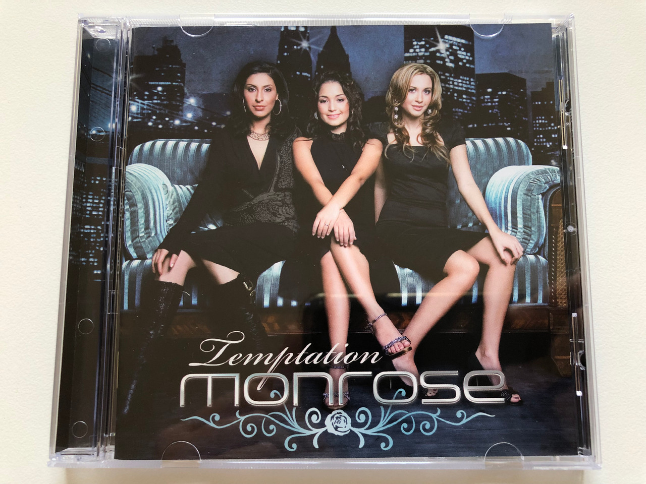 https://cdn10.bigcommerce.com/s-62bdpkt7pb/products/0/images/198054/Temptation_-_Monrose_Starwatch_Music_Audio_CD_2006_5051011-8689-2-4_1__70657.1635930104.1280.1280.JPG?c=2&_gl=1*1v1f8f5*_ga*MjA2NTIxMjE2MC4xNTkwNTEyNTMy*_ga_WS2VZYPC6G*MTYzNTkyMjI4Mi4xNTMuMS4xNjM1OTI5ODE2LjI5