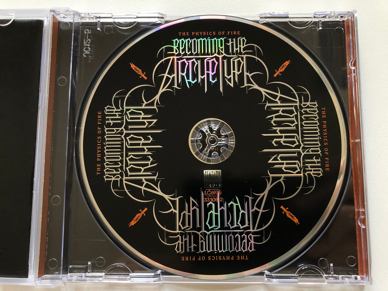 https://cdn10.bigcommerce.com/s-62bdpkt7pb/products/0/images/198076/The_Physics_Of_Fire_-_Becoming_The_Archetype_Century_Media_Audio_CD_2007_33106-2_3__95327.1635931822.1280.1280.JPG?c=2&_gl=1*jbazq3*_ga*MjA2NTIxMjE2MC4xNTkwNTEyNTMy*_ga_WS2VZYPC6G*MTYzNTkyMjI4Mi4xNTMuMS4xNjM1OTMxNTE1LjMy