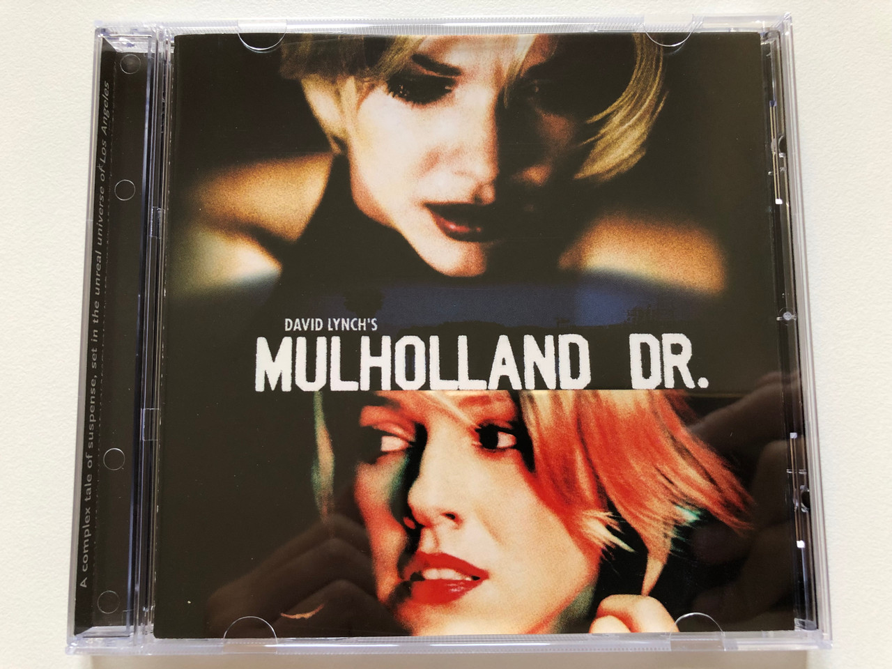https://cdn10.bigcommerce.com/s-62bdpkt7pb/products/0/images/198093/David_Lynchs_Mulholland_Dr._Milan_Audio_CD_2001_74321_89823_2_1__92658.1635933968.1280.1280.JPG?c=2&_gl=1*dkp2y9*_ga*MjA2NTIxMjE2MC4xNTkwNTEyNTMy*_ga_WS2VZYPC6G*MTYzNTkyMjI4Mi4xNTMuMS4xNjM1OTMzNzc2LjM2