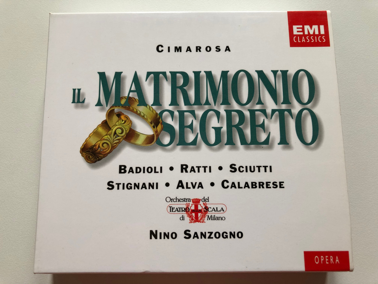 https://cdn10.bigcommerce.com/s-62bdpkt7pb/products/0/images/198359/Cimarosa_-_Il_Matrimonio_Segreto_-_Badioli_Ratti_Sciutti_Stignani_Alva_Calabrese_Orchestra_Del_Teatro_Alla_Scala_Di_Milano_Nino_Sanzogno_Opera_EMI_Classics_2x_Audio_CD_1997_5_66513_2_1__43347.1636096742.1280.1280.JPG?c=2&_gl=1*1qkte6n*_ga*MjA2NTIxMjE2MC4xNTkwNTEyNTMy*_ga_WS2VZYPC6G*MTYzNjA5MDUyMi4xNTguMS4xNjM2MDk2NTA3LjQ3