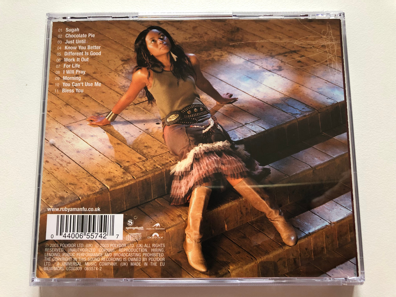https://cdn10.bigcommerce.com/s-62bdpkt7pb/products/0/images/198393/Ruby_Amanfu_Smoke_Honey_Polydor_Audio_CD_2003_065575-2_7__75746.1636099153.1280.1280.JPG?c=2&_gl=1*bk2zov*_ga*MjA2NTIxMjE2MC4xNTkwNTEyNTMy*_ga_WS2VZYPC6G*MTYzNjA5MDUyMi4xNTguMS4xNjM2MDk4OTA5LjMx