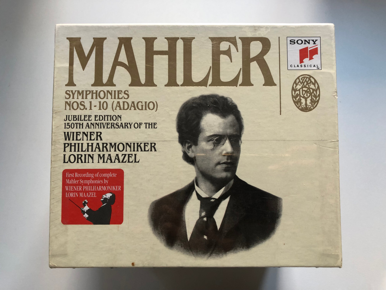 https://cdn10.bigcommerce.com/s-62bdpkt7pb/products/0/images/198487/Mahler_-_Symphonies_Nos._1-10_Adagio_Jubilee_Edition_150th_anniversary_of_the_Wiener_Philharmoniker_Lorin_Maazel_Sony_Classical_14x_Audio_CD_SX14K_48198_1__75718.1636104999.1280.1280.JPG?c=2&_gl=1*o2yho1*_ga*MjA2NTIxMjE2MC4xNTkwNTEyNTMy*_ga_WS2VZYPC6G*MTYzNjA5MDUyMi4xNTguMS4xNjM2MTA0ODIzLjI4