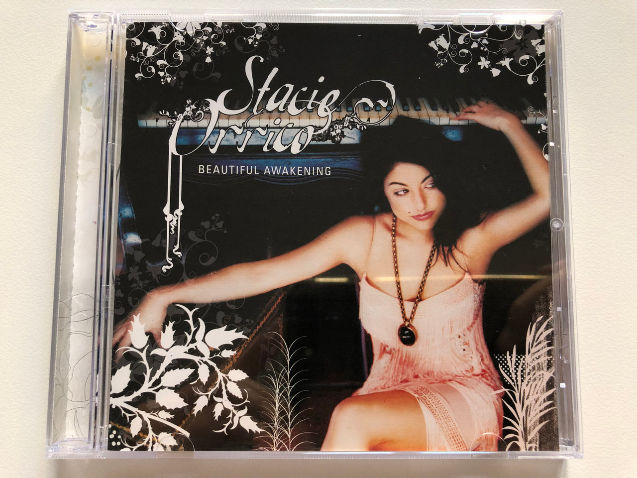 https://cdn10.bigcommerce.com/s-62bdpkt7pb/products/0/images/198706/Stacie_Orrico_Beautiful_Awakening_Virgin_Audio_CD_2006_7243_4_74843_2_2_1__09717.1636365299.1280.1280.JPG?c=2&_gl=1*m6g6us*_ga*MjA2NTIxMjE2MC4xNTkwNTEyNTMy*_ga_WS2VZYPC6G*MTYzNjM1NTMwMi4xNTkuMS4xNjM2MzYzMjE0LjU1