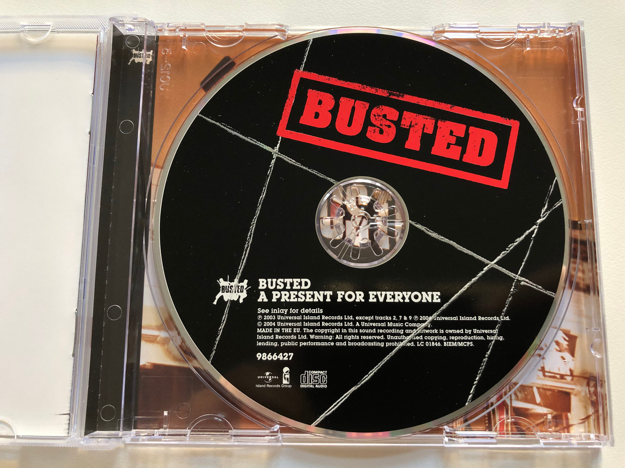 https://cdn10.bigcommerce.com/s-62bdpkt7pb/products/0/images/198740/A_Present_For_Everyone_-_Busted_Island_Records_Group_Audio_CD_2004_9866427_3__08924.1636369292.1280.1280.JPG?c=2&_gl=1*1u3i3jq*_ga*MjA2NTIxMjE2MC4xNTkwNTEyNTMy*_ga_WS2VZYPC6G*MTYzNjM2NTc5Mi4xNjAuMS4xNjM2MzY5MTgyLjI3
